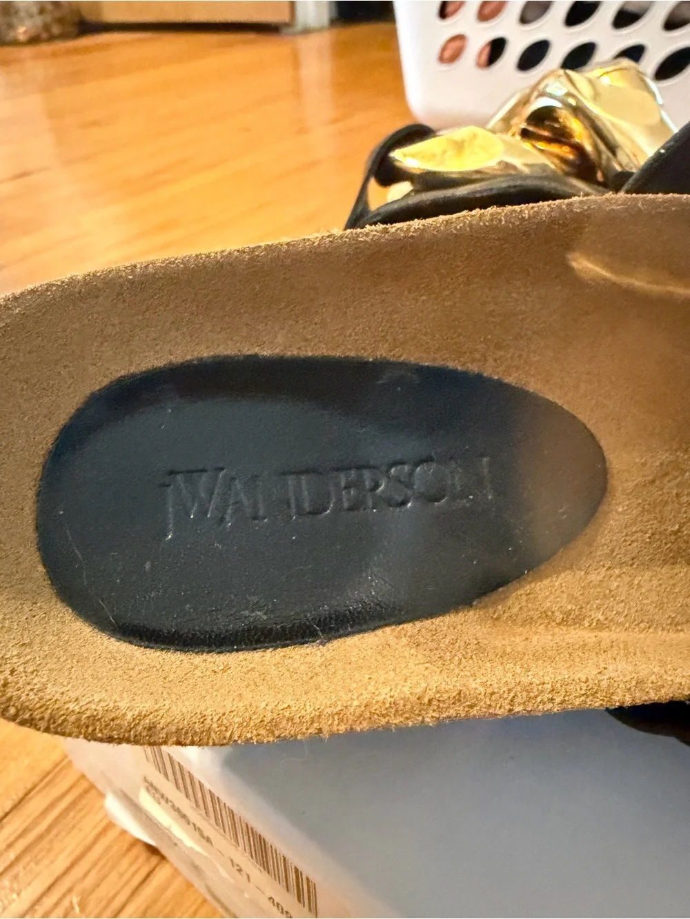 JW Anderson Women’s Black Slide Sandals with Gold Chain Accent